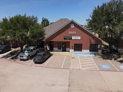 front parking lot view of Smile Time Dentistry in DeSoto, TX