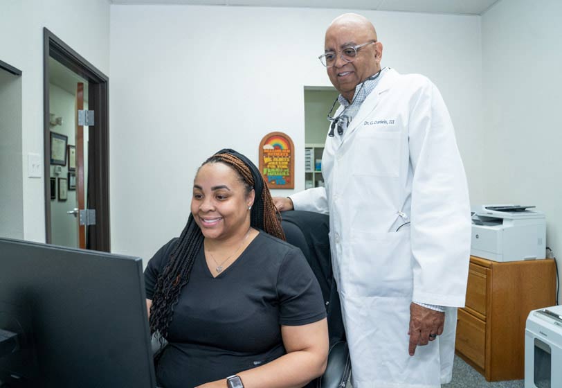 DeSoto dentist Dr. Daniels and his treatment coordinator at Smile Time Dentistry